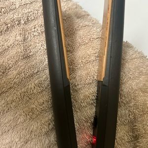 GHD hair straightening iron in good working condition.